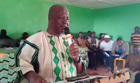 Honorable Francis Sakila Nyumalin Sr., Minister of Internal Affairs, serves as the guest speaker at the official turnover and induction ceremonies of the Voinjama District Youth Leadership. The event features Prince M. Dorbor, the President-Elect of Voinjama District Youths, and takes place in Vezala Town, Voinjama District, Lofa County. 