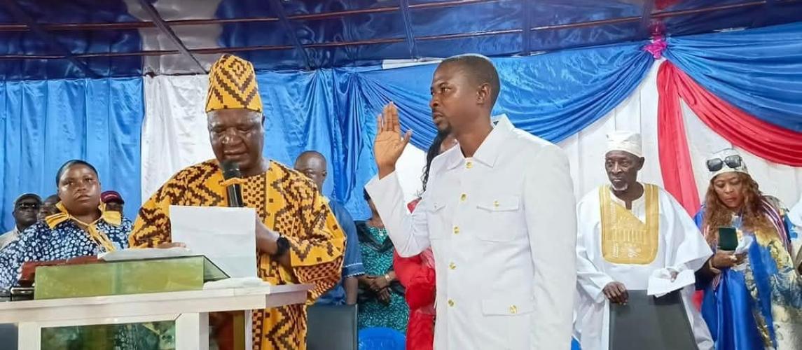 Hon. Karyou Johnson takes the oath as the 46th Superintendent of Grand Bassa County at the Unification Pavilion on March 14, marking a new era of leadership under the guidance of Hon. F. Sakila Nyumalin, Sr., Minister of Internal Affairs.